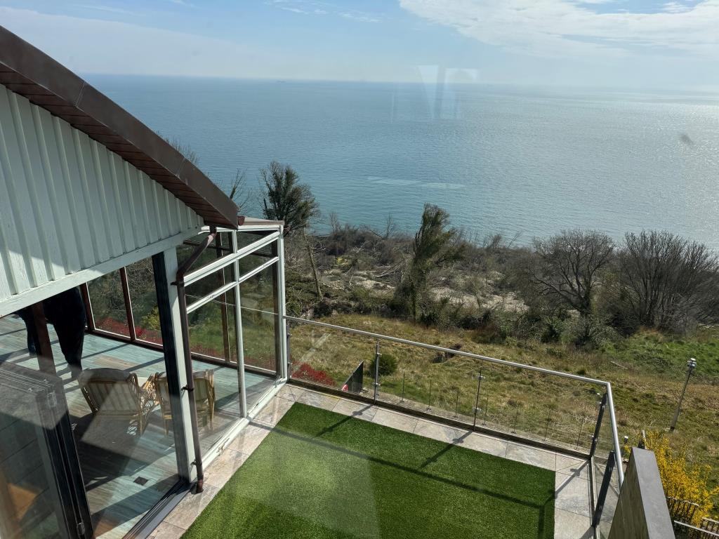 Lot: 106 - UNIQUE PROPERTY WITH STUNNING SEA VIEWS OVER THE ENGLISH CHANNEL - A View from one of the Bedroom Windows